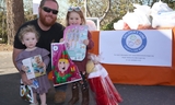 Family receives toys from Children's Fund